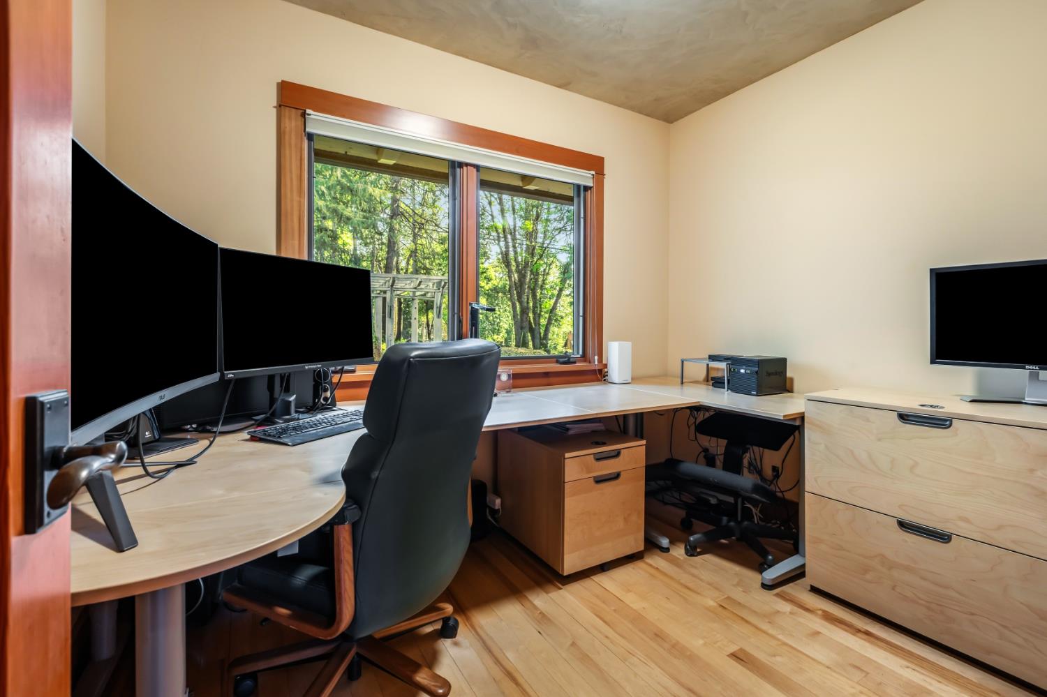 12278 Cement Hill Road Nevada City, CA 95959 - Photo 22 of 61 a view of a workspace with furniture and a window