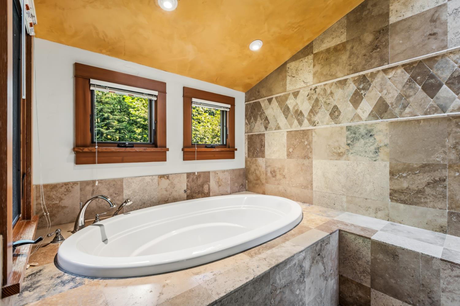 12278 Cement Hill Road Nevada City, CA 95959 - Photo 32 of 61 a bathroom with a sink and a bathtub