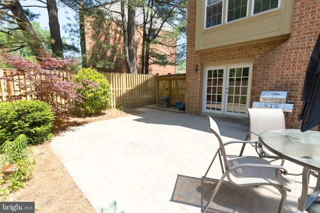 a view of a bench in a patio