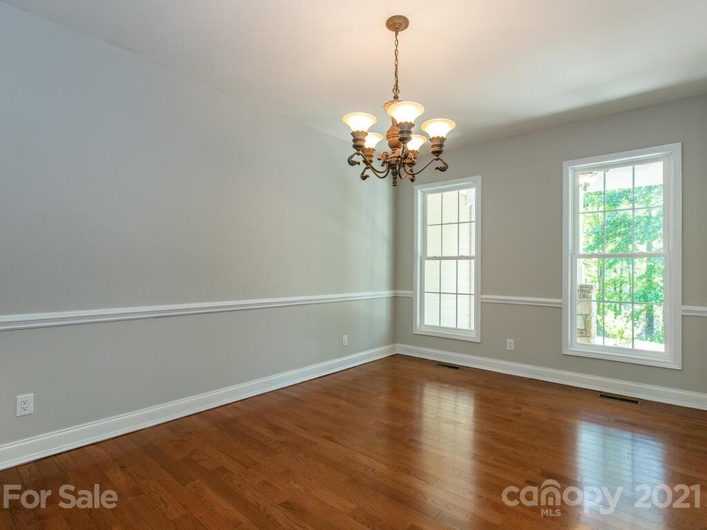 356 Green Hills Road Mill Spring, NC 28756 - Photo 12 of 31 a view of an empty room with window
