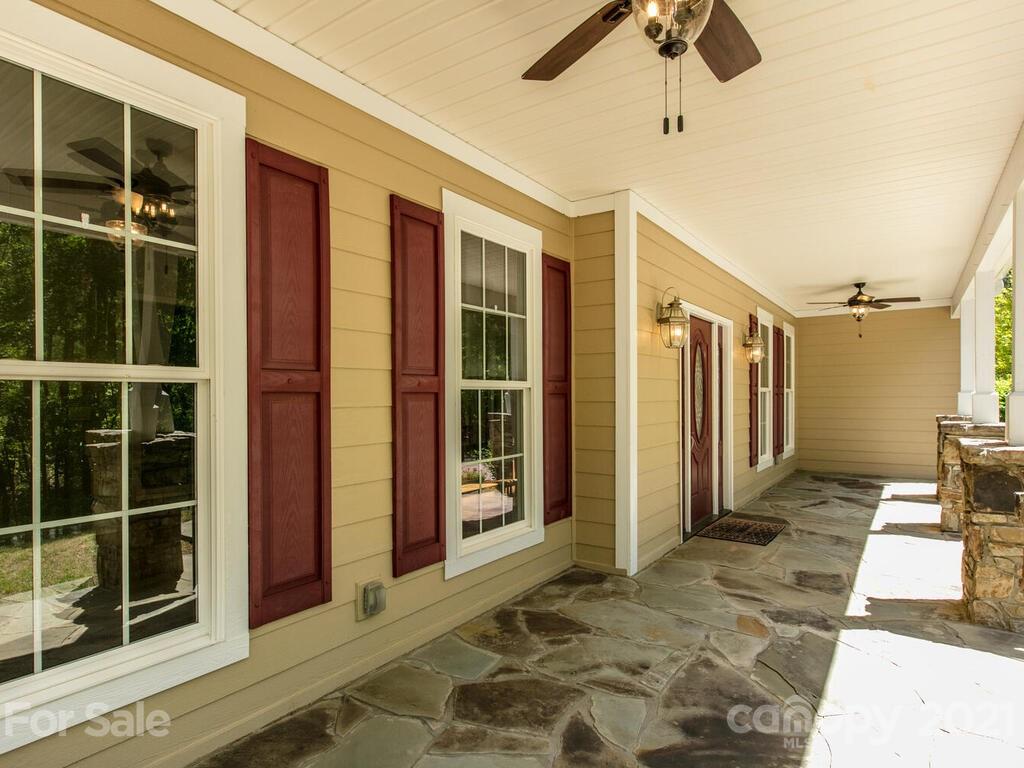 356 Green Hills Road Mill Spring, NC 28756 - Photo 3 of 31 a view of a balcony