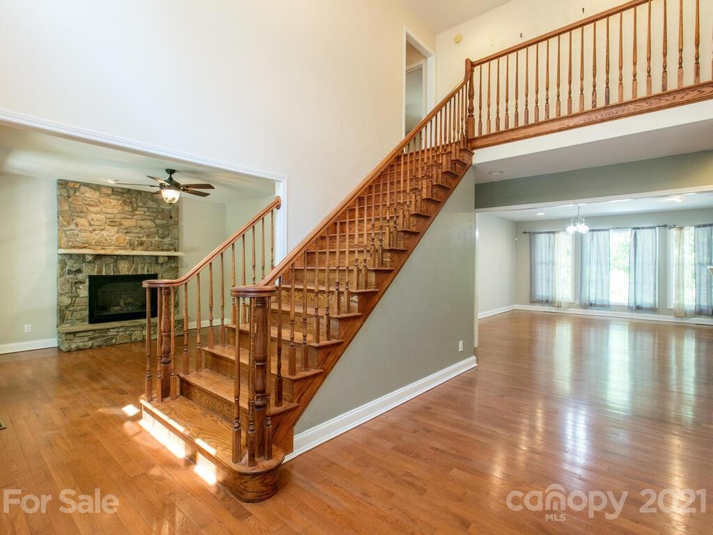 356 Green Hills Road Mill Spring, NC 28756 - Photo 4 of 31 a view of entryway and hall with wooden floor