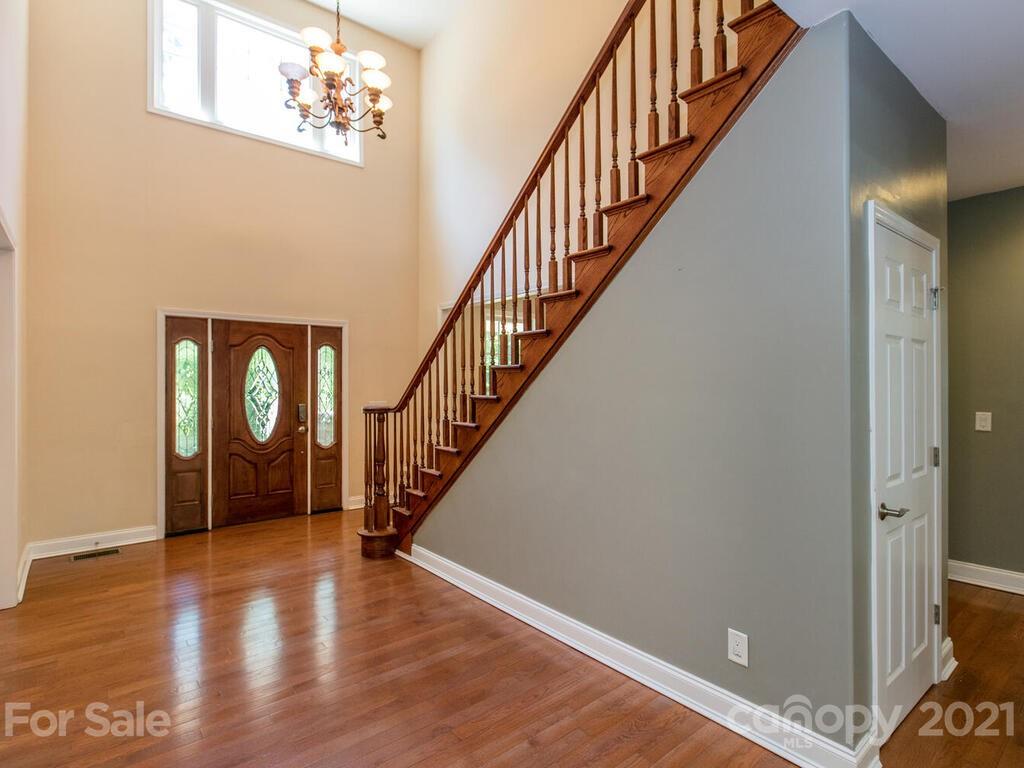356 Green Hills Road Mill Spring, NC 28756 - Photo 5 of 31 a view of an entryway with wooden floor