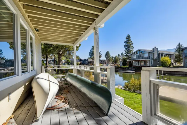 a view of a balcony with chairs
