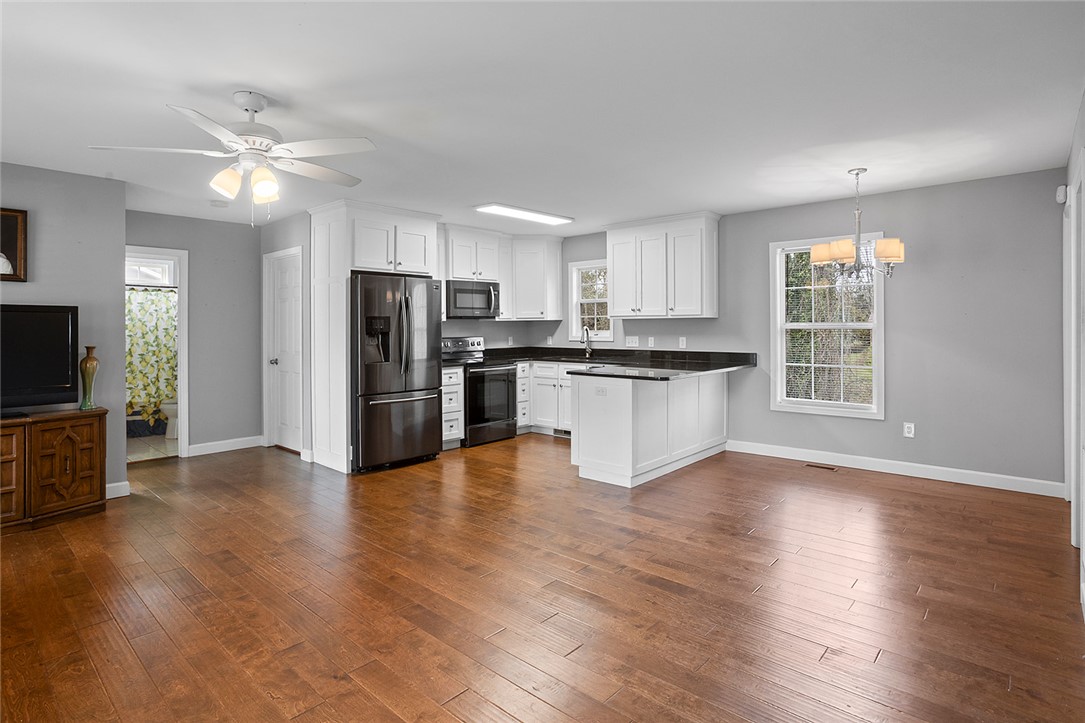 119 Nicholas Court Easley, SC 29640 - Photo 15 of 33 This inviting space offers a seamless blend of everyday living with natural light and modern design.