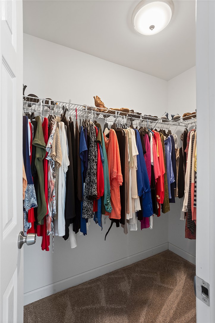 119 Nicholas Court Easley, SC 29640 - Photo 30 of 33 This organized walk-in closet features ample hanging space for a curated wardrobe.