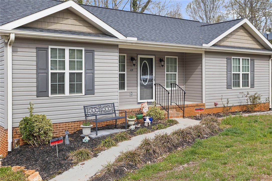 119 Nicholas Court Easley, SC 29640 - Photo 3 of 33 This charming home offers a welcoming facade with a classic design.