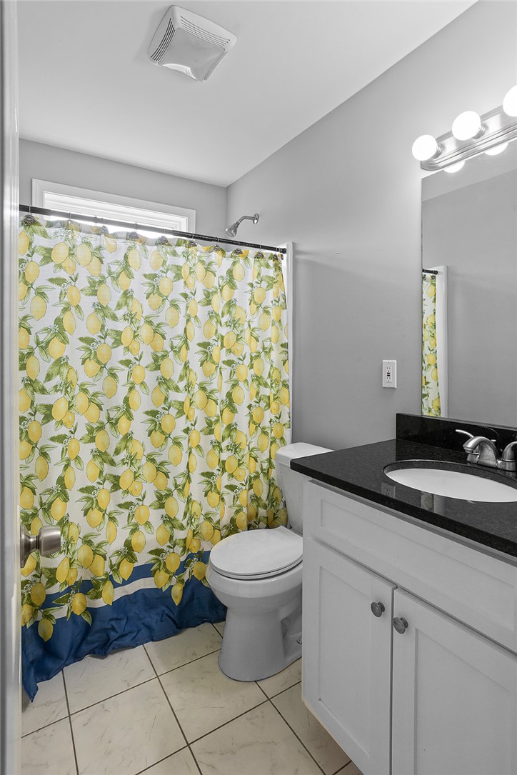 119 Nicholas Court Easley, SC 29640 - Photo 10 of 33 This bright bathroom features a vanity with ample storage and a refreshing shower area.