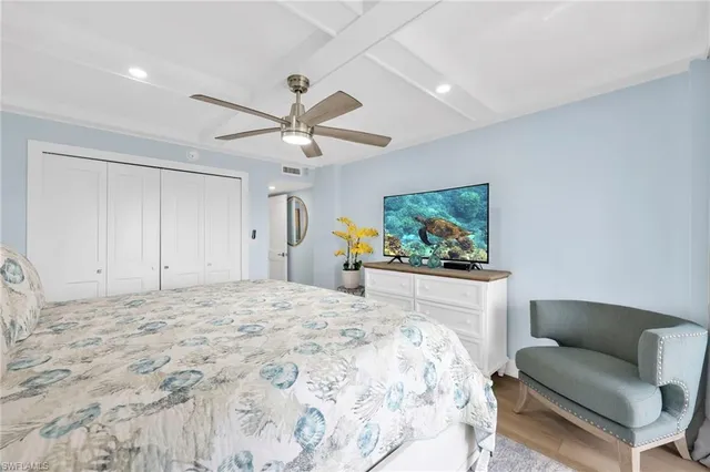 a balcony with a table and chairs