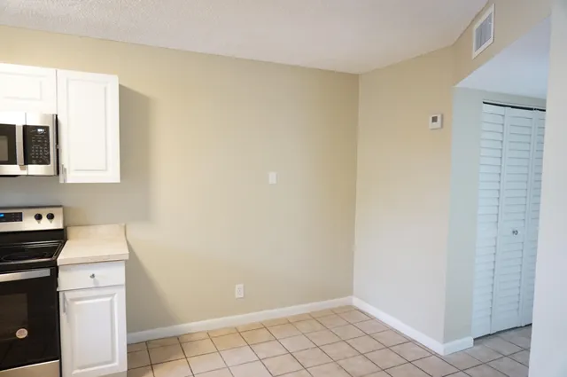 a view of a storage & utility room with a sink