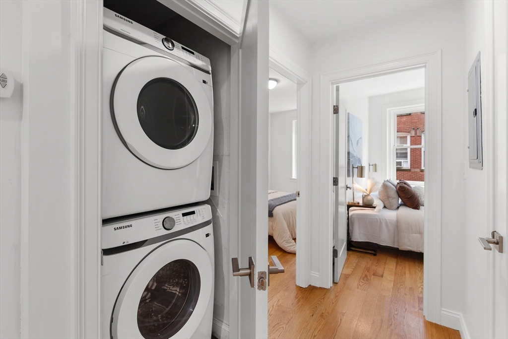 81 Prince Street, Unit 2 Boston, MA 02113 - Photo 12 of 22 a view of a hallway with washer and dryer