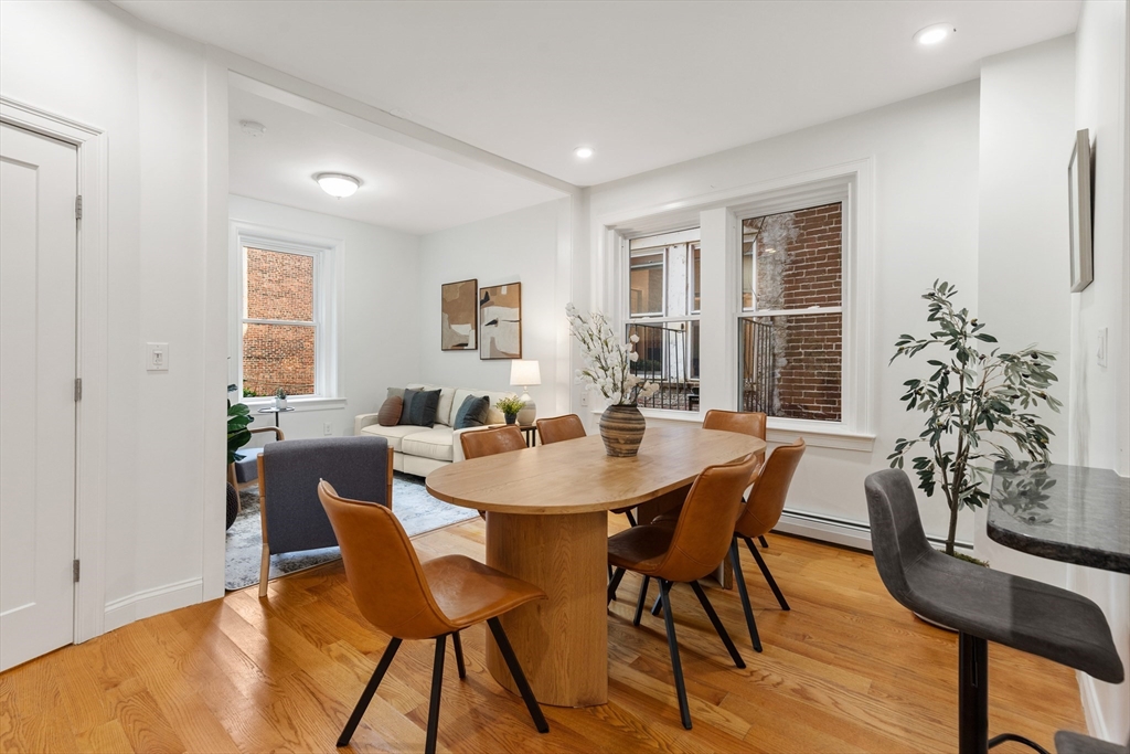 81 Prince Street, Unit 2 Boston, MA 02113 - Photo 2 of 22 a view of a dining room with furniture and window