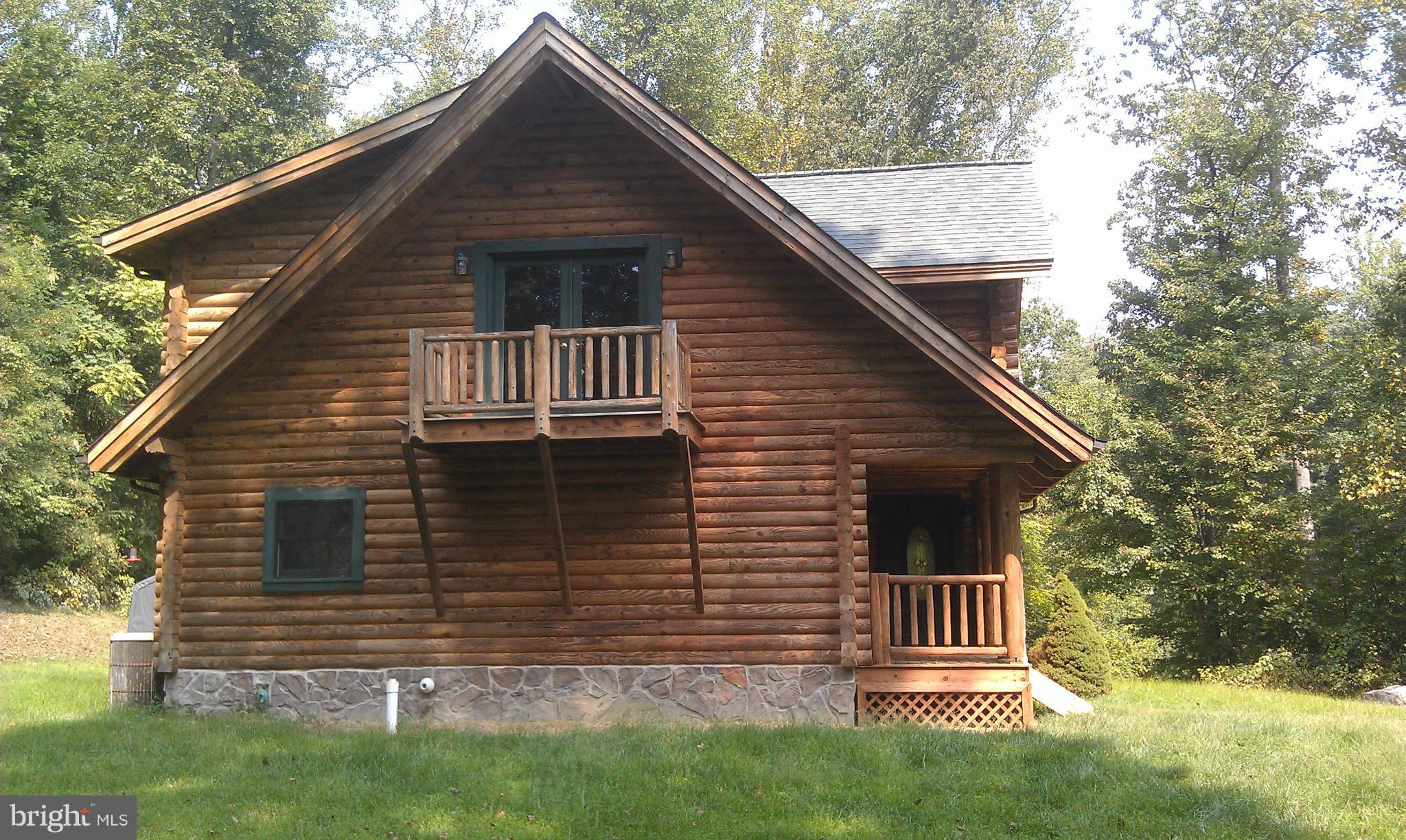 10471 Warland Road Marshall, VA 20115 - Photo 3 of 18 a front view of a house with a yard
