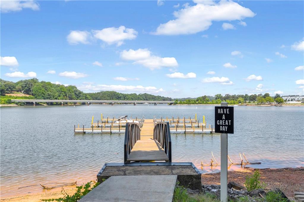 2941 Lake Hollow Road Gainesville, GA 30501 - Photo 44 of 53 a view of a lake with houses in front of it
