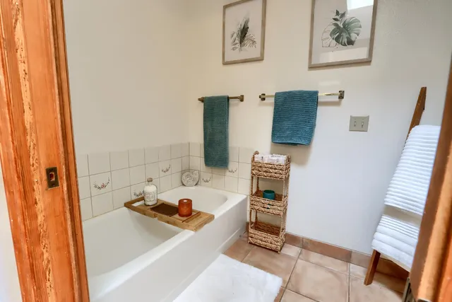 a bathroom with a sink and a window