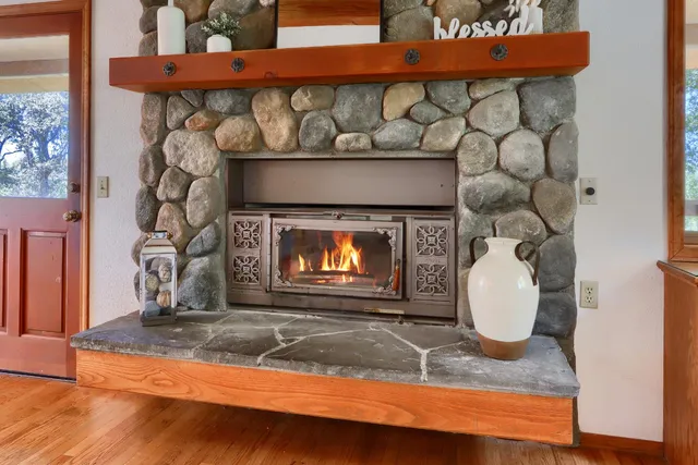 a fireplace with a clock on top of it