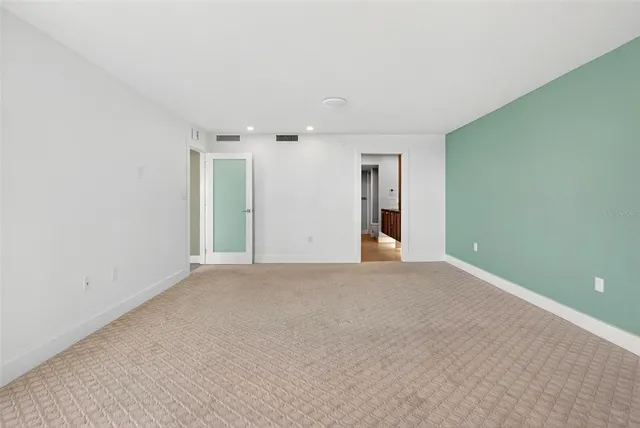 a view of living room with furniture and window
