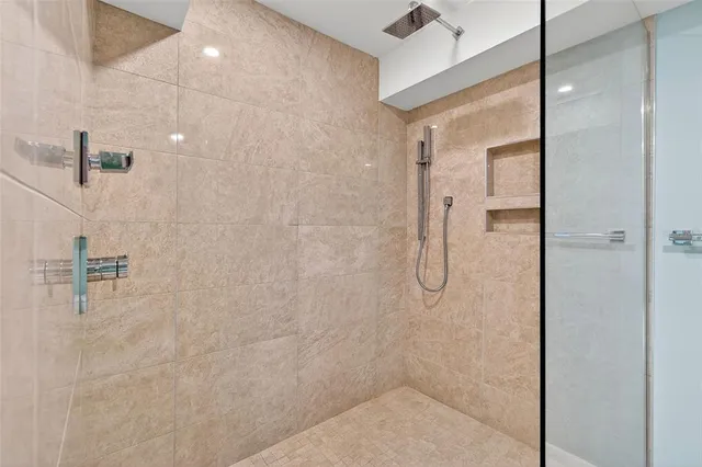 a view of a chair and table in backyard