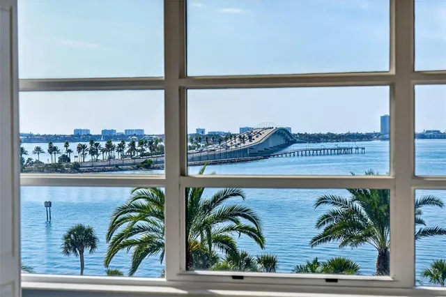 a view of a balcony with chairs