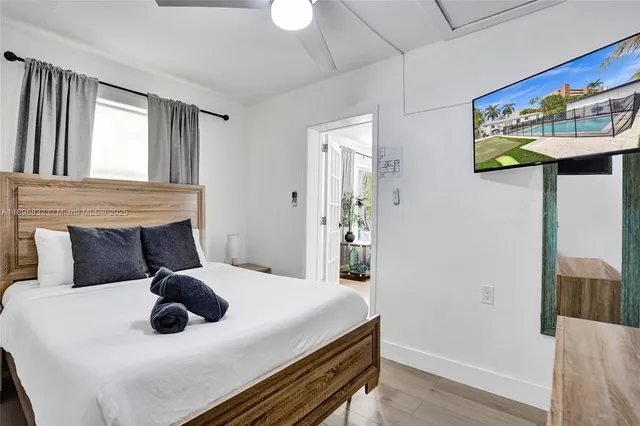 an aerial view of a house with a garden and plants