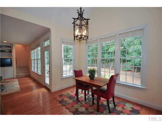 1611 Weatherford Circle Raleigh, NC 27604 - Photo 11 of 25 Cook friendly kitchen with granite counters, tile back splash, great gas stove, refrigerator included, wonderful eat-in bar area, and spacious breakfast area Breakfast Area