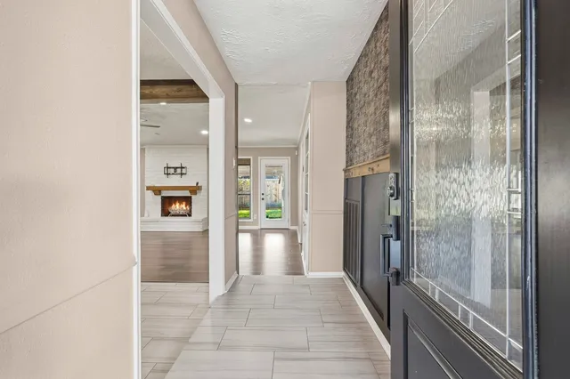 a bathroom with a shower and a sink