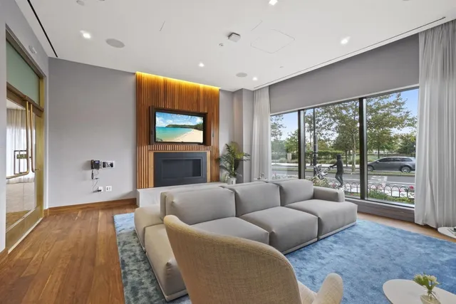 a kitchen with stainless steel appliances granite countertop a sink and a stove