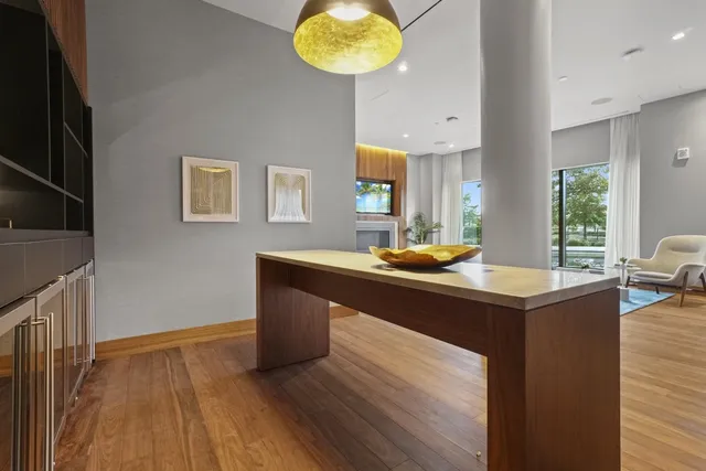 a room with gym equipment and mirrors