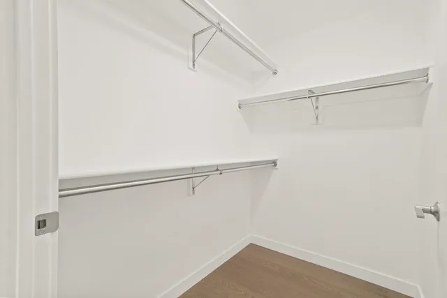 a view of a room with racks on the wall