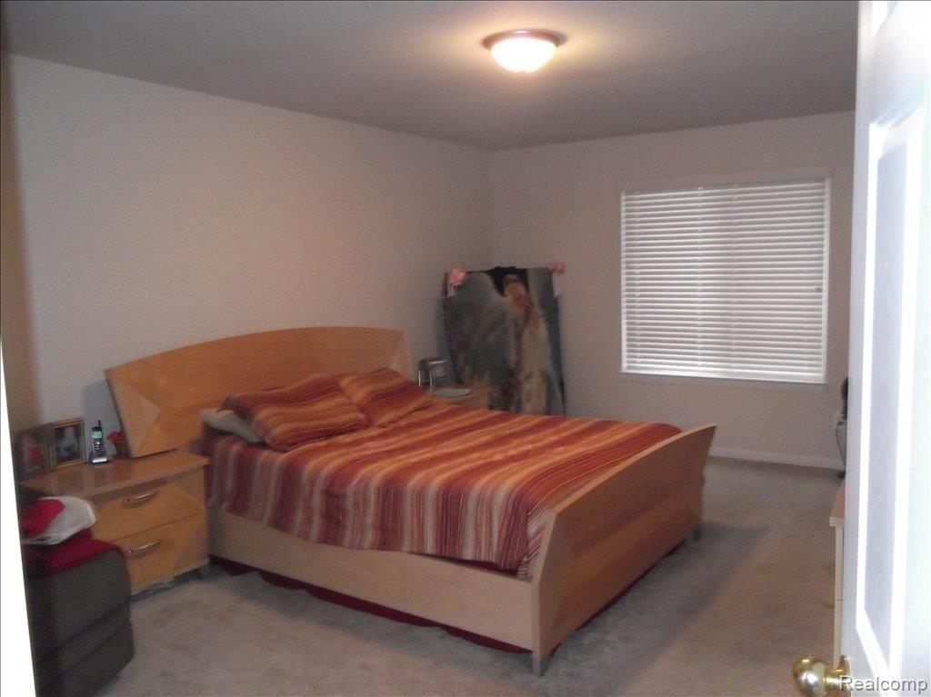 50938 Nesting Ridge Drive Macomb, MI 48044 - Photo 3 of 8 Master Bedroom