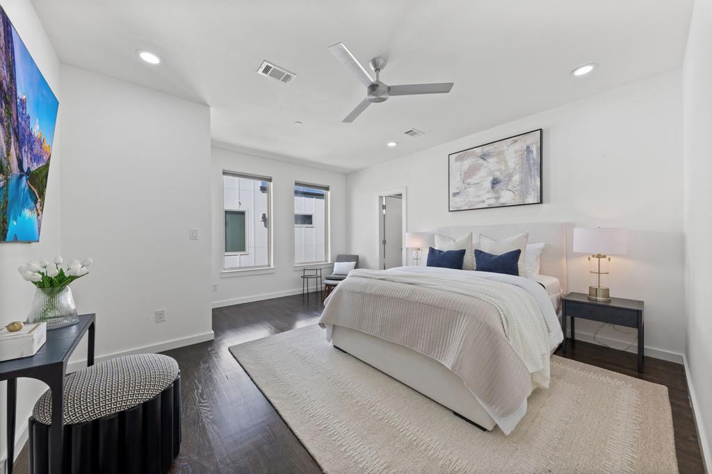 1915 Summit Avenue, Unit 2 Dallas, TX 75206 - Photo 13 of 39 a spacious bedroom with a bed and furniture