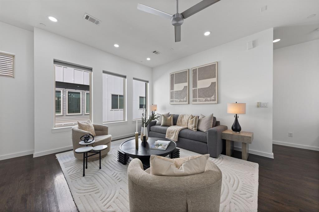 1915 Summit Avenue, Unit 2 Dallas, TX 75206 - Photo 2 of 39 a living room with furniture and wooden floor