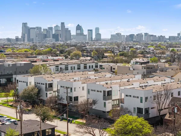 a view of city with tall buildings