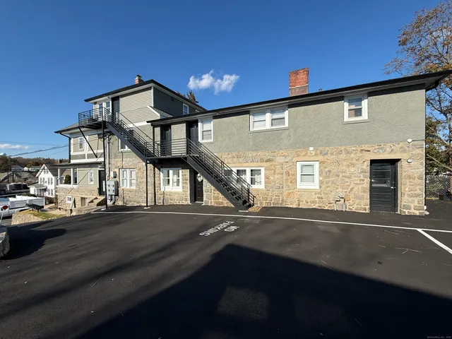 a view of street with parked cars