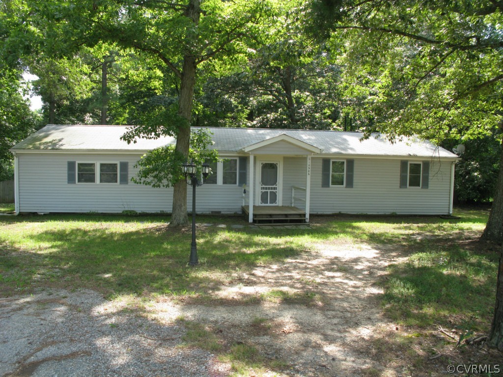 15906 Glebe Road Dewitt, VA 23840 - Photo 1 of 3 a view of a house with a yard