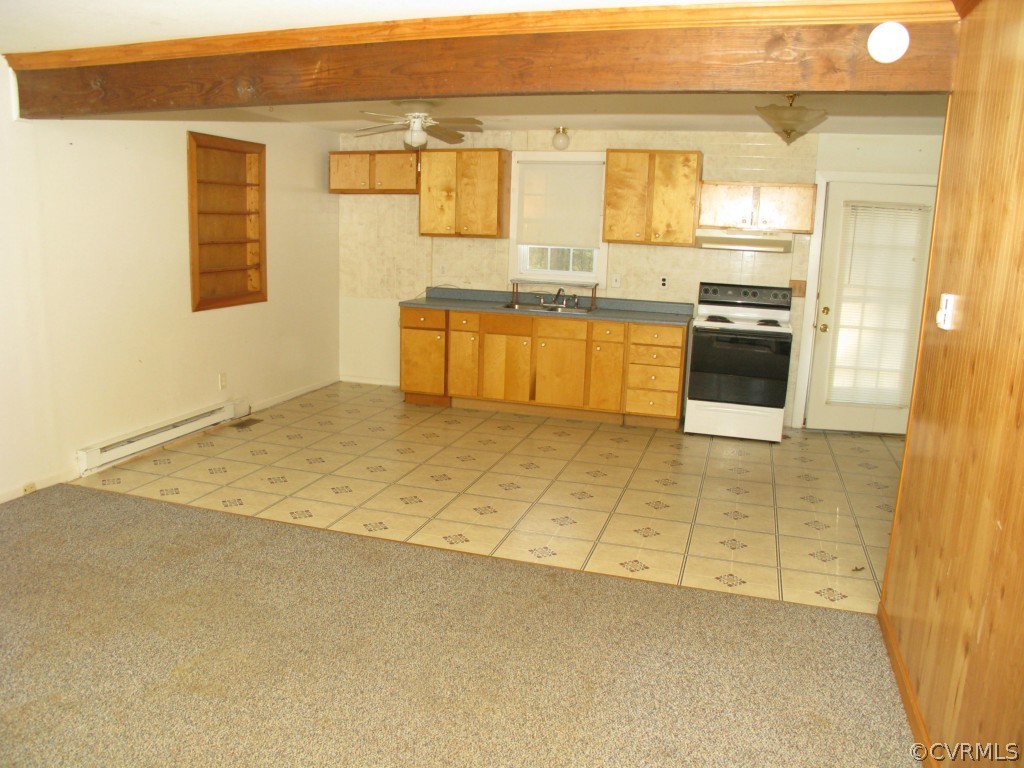 15906 Glebe Road Dewitt, VA 23840 - Photo 2 of 3 a kitchen with stainless steel appliances granite countertop a sink and cabinets