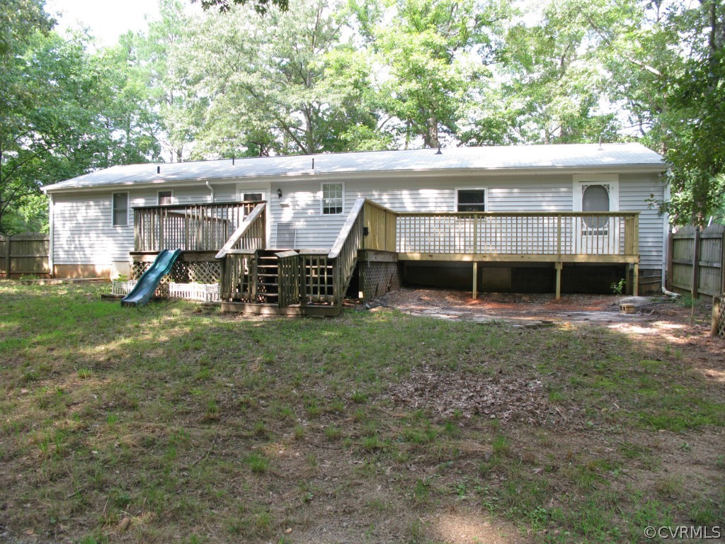 15906 Glebe Road Dewitt, VA 23840 - Photo 3 of 3 a view of a house with backyard porch and sitting area