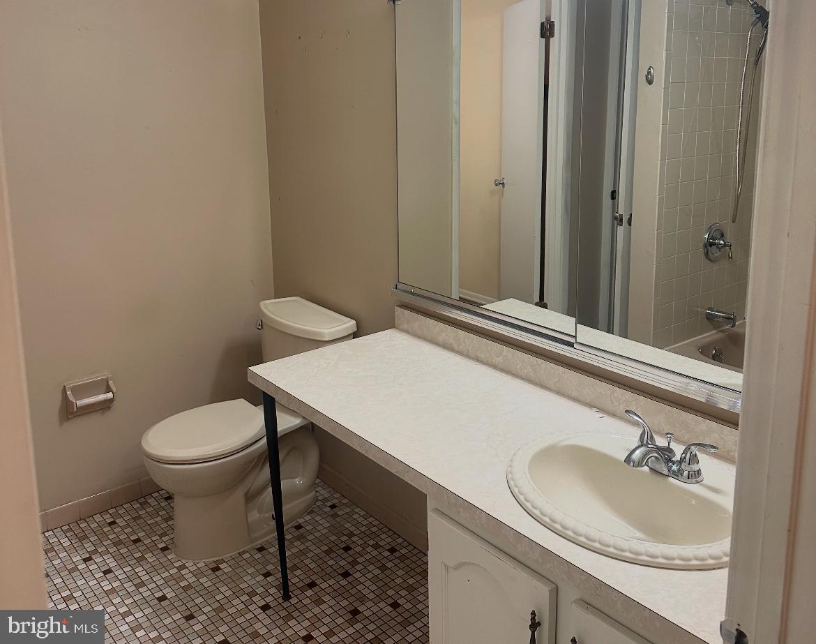 46 Georgetown Road Lindenwold, NJ 08021 - Photo 7 of 10 a bathroom with a granite countertop toilet sink and mirror