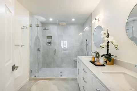 a bedroom with a bed and a cabinets