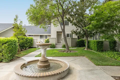 a house view with a garden space