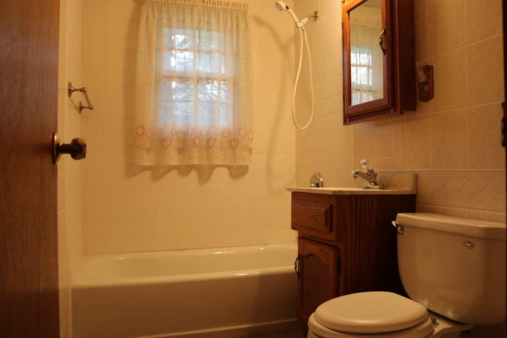 19240 Airport Road Romeoville, IL 60446 - Photo 13 of 14 a white toilet sitting next to a bath tub