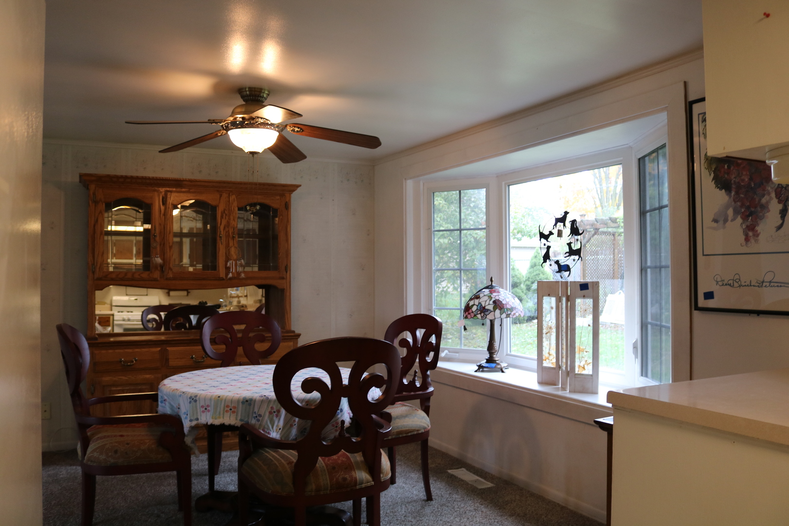 19240 Airport Road Romeoville, IL 60446 - Photo 3 of 14 a view of a dining room with furniture and chandelier