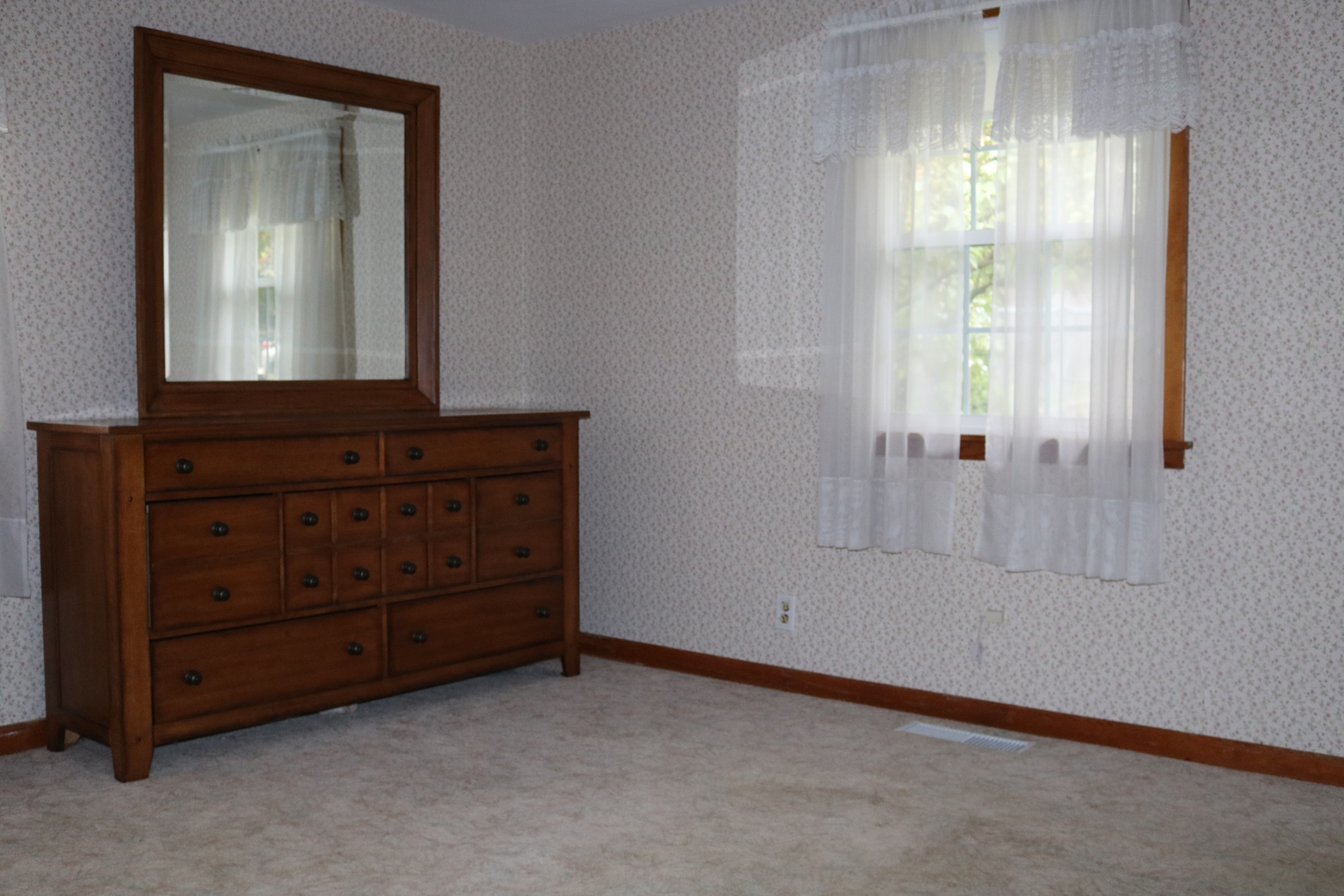19240 Airport Road Romeoville, IL 60446 - Photo 7 of 14 an empty room with windows and cabinet