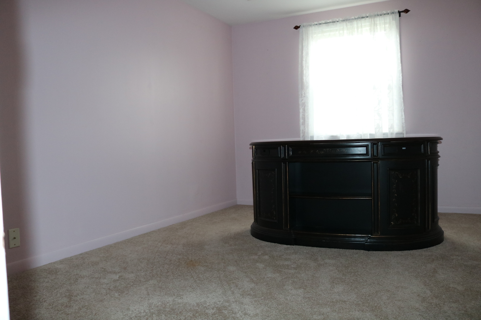 19240 Airport Road Romeoville, IL 60446 - Photo 9 of 14 a room with a fireplace and a window