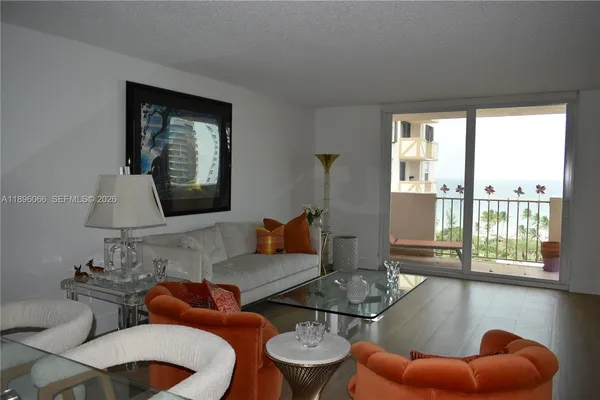 a bedroom with a bed and a night stand