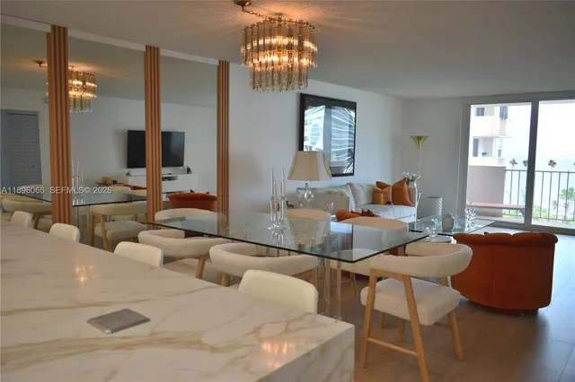 a bathroom with a shower a toilet and sink