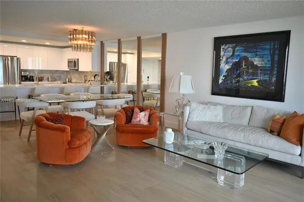 a room with wall paintings on the wall and paintings on the wall