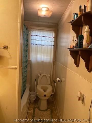 6563 Robinson Bridge Road, Unit A Morven, NC 28119 - Photo 6 of 9 a bathroom with a toilet and a shower