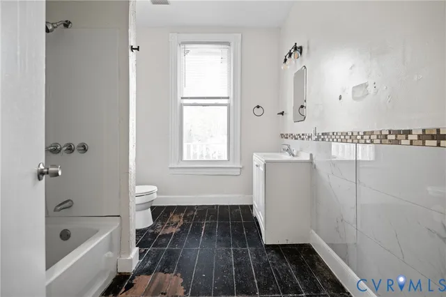 a bathroom with a bathtub