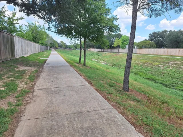 a park with some trees in the background